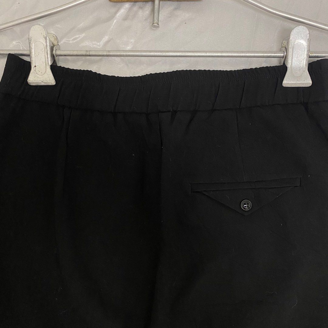 High Rise Wide Leg Flare Trouser (Category: Other Bottoms) located in Malabon City. Submitted by k_mby (Listing ID 1400541194, Image 2). Description: • waist 26-28 • length 40 • solid black • with slit both sides • 2 front pockets (no back pockets) • no issue.