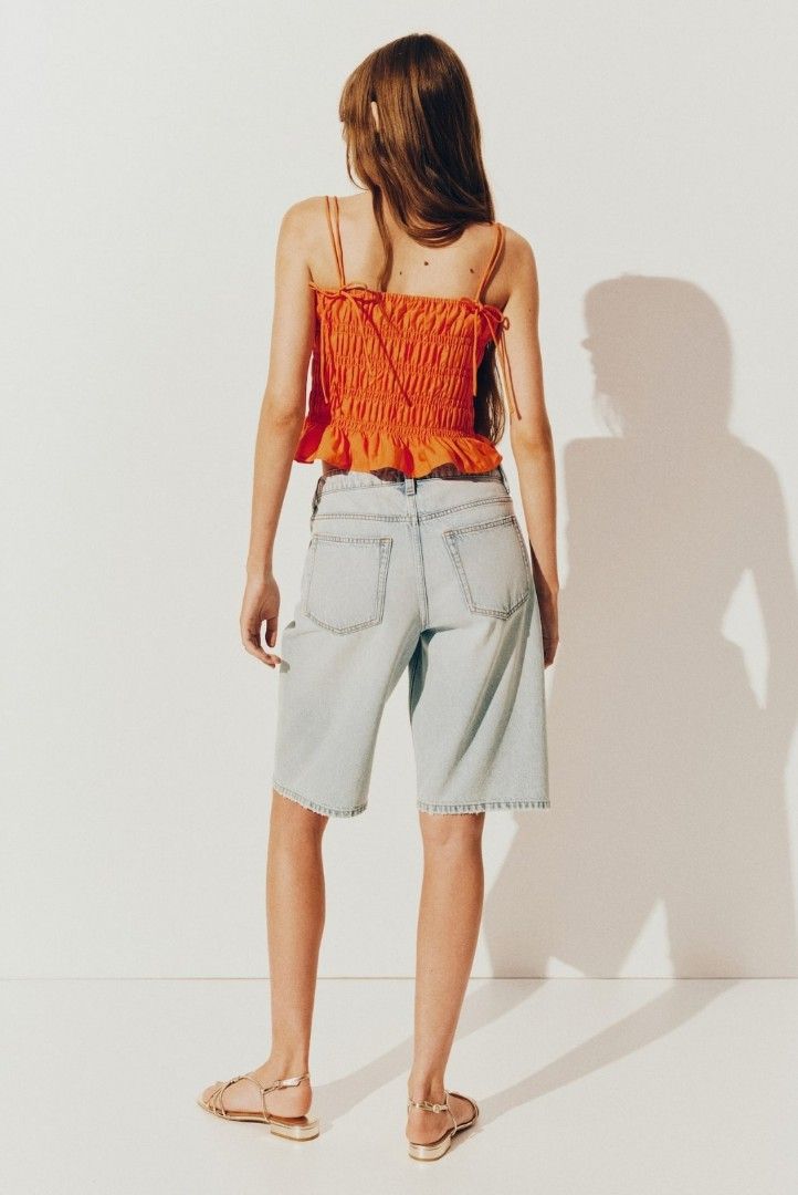 H&M Orange Smocked Ribbon Tie Top (Category: Sleeveless) located in Manila. Submitted by miyoungg (Listing ID 1400513834, Image 2). Description: Never worn, only washed. RFS: Decluttering, too much clothes na :(.