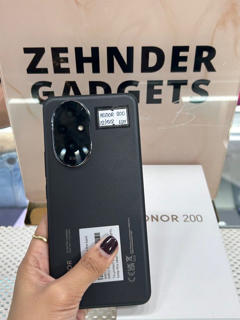 HONOR 200 12/512GB OPENLINE (COMPLETE) SLIGHTLY USED (Category: Huawei) located in San Juan City. Submitted by desireebayal96 (Listing ID 1400420581, Image 1). Description: HONOR 200 (BLACK) * 12/512GB * OPENLINE * DUAL SIM * 50MP * 5200mAh * 120Hz * SNAPDRAGON 7 GEN 3 * 100% SMOOTH * NO DENTS * NO AMOLED BURN * NO ISSUE * NO HISTORY OF REPAIR * WITH 100W ADAPTER * WITH BOX SAME SERIAL OPEN FOR COD SAME DAY DELIVERY PLUS SHIPPING FEE MESSAGE ME D