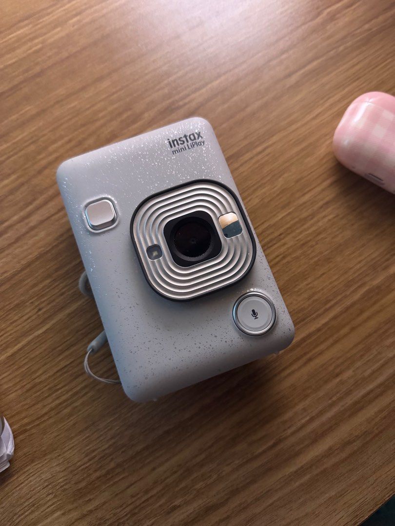 INSTAX MINI LIPLAY (Category: Cameras) located in Antipolo. Submitted by eliiiyo (Listing ID 1400505180, Image 1). Description: complete with box cable and manual issue: sd card cover is missing as seen on the photo.