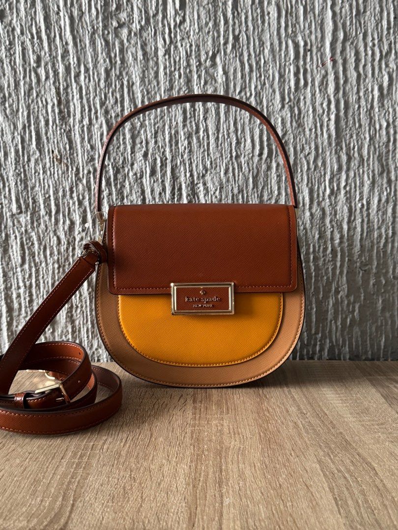 Kate spade Reegan saddle tricolor (Category: Luxury Bags & Wallets) located in Pasig City. Submitted by jackie_ginger (Listing ID 1400462732, Image 1). Description: Onhand with tag 💯orig from US.
