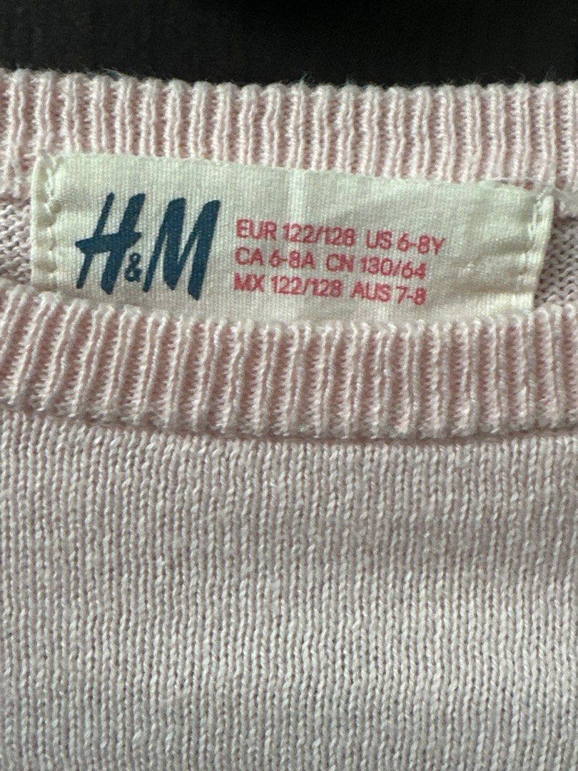 Kids H&M Pink Butterfly Sequin Sweater (Category: Babies & Kids Fashion) located in San Pedro. Submitted by Graceleen (Listing ID 1400406465, Image 2). Description: - H&M pink sweater - Features a sequined butterfly design - Long sleeves and round neckline - Size: EUR 122/128, US 6-8Y, CA 6-8A, CN 130/64, AUS 7-8 Used only for 3-4 times, still in mint condition..