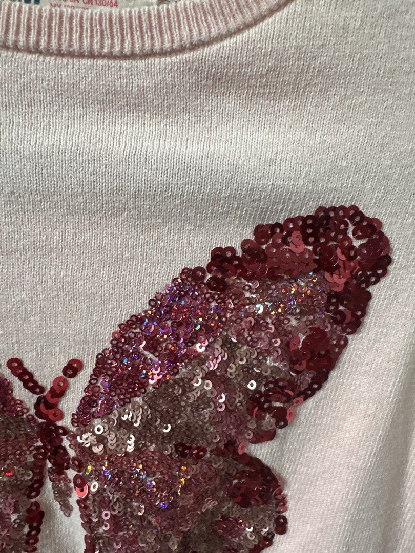 Kids H&M Pink Butterfly Sequin Sweater (Category: Babies & Kids Fashion) located in San Pedro. Submitted by Graceleen (Listing ID 1400406465, Image 3). Description: - H&M pink sweater - Features a sequined butterfly design - Long sleeves and round neckline - Size: EUR 122/128, US 6-8Y, CA 6-8A, CN 130/64, AUS 7-8 Used only for 3-4 times, still in mint condition..
