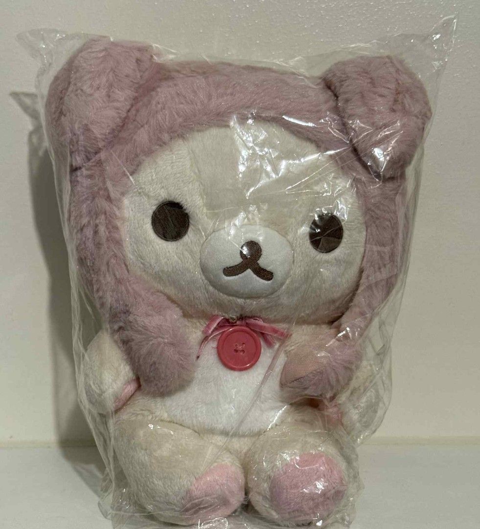 Korilakkuma Rabbit Tea Time Plush (Category: Plushies & Soft Toys) located in Caloocan City. Submitted by p3pper01 (Listing ID 1400537153, Image 1). Description: Adorable Rilakkuma plush toy is still in its original packaging. It features a cute design with a pink hood and a matching pink button. The plush has a soft, fluffy texture and is perfect for cuddling or collecting. It's a charming addition to any Rilakkuma fan's collection..