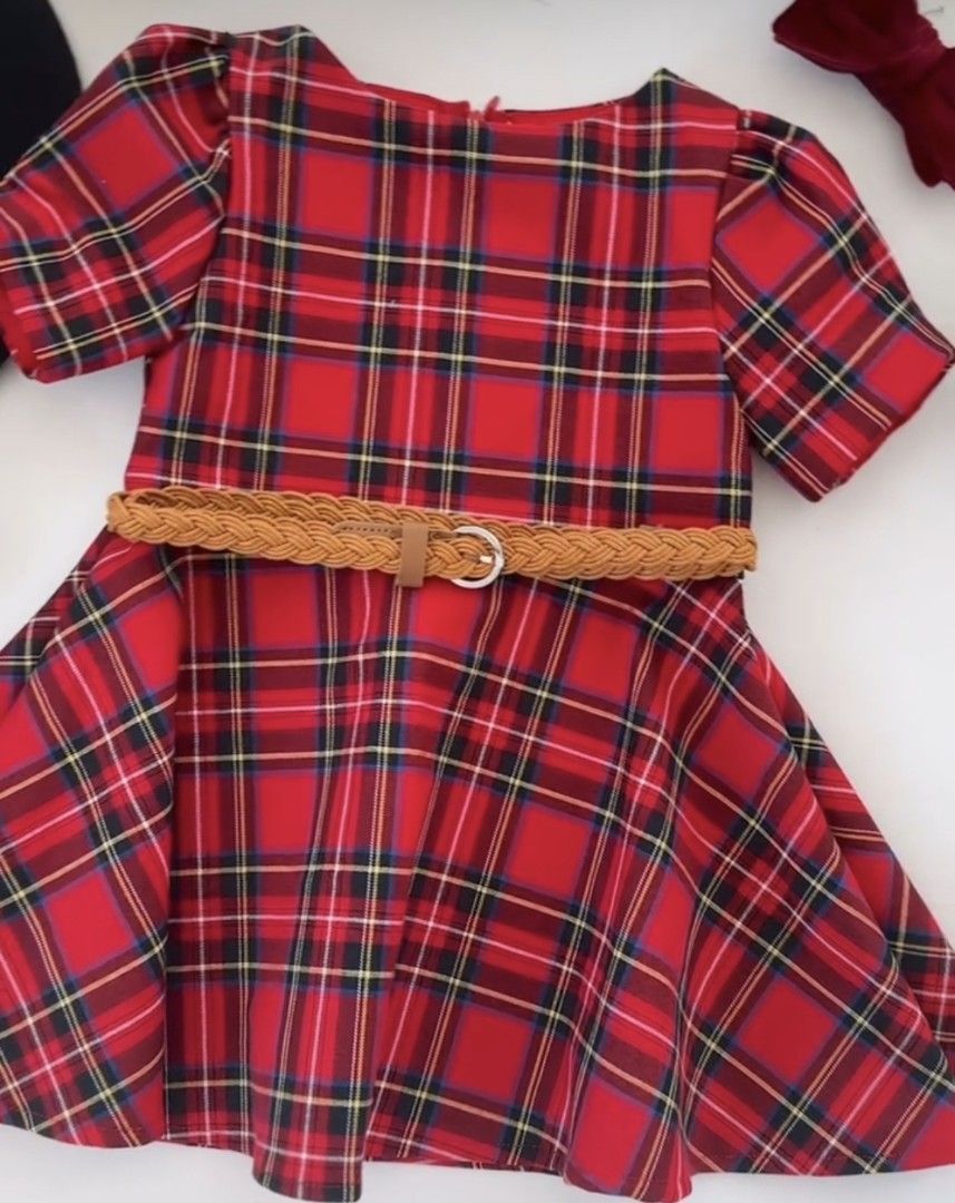 Laila & Lyra Plaid Dress (Category: Babies & Kids Fashion) located in Manila. Submitted by kbellbau (Listing ID 1400430682, Image 1). Description: - Laila & Lyra red plaid dress - Round neckline - Short sleeves - Flared skirt - Brown braided belt with gold buckle - Comfortable fabric - Suitable for special occasions or everyday wear.