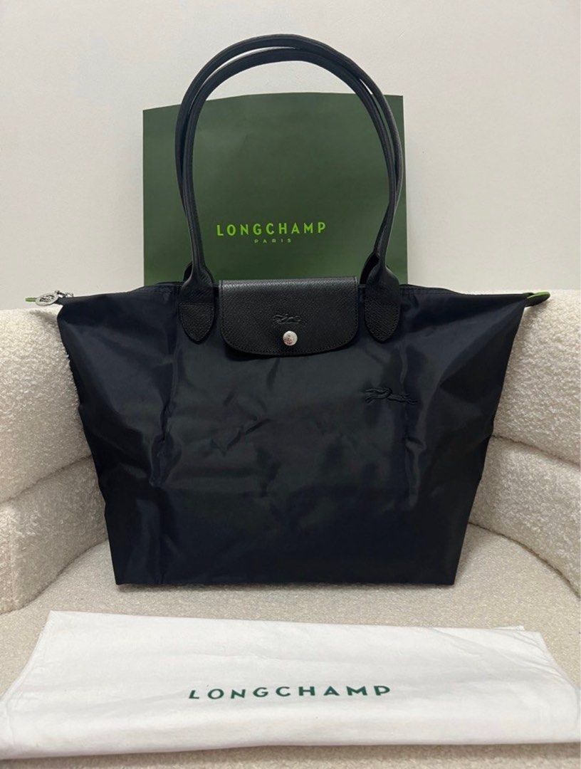 Longchamp Le Pliage Tote Bag in Black (Category: Luxury Bags & Wallets) located in Bayambang. Submitted by elle.declutter (Listing ID 1400520326, Image 2). Description: Selling this extra Longchamp Le Pliage Tote bag i also bought here. got this as a gift for my mom but ended up my sister got her the exact same bag. also if it wasn’t for my trip, i wont’t sell this because of its high quality but i had to. p.s.: first three photos are from the se
