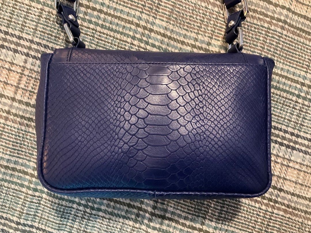 Preowned Excellent Condition Longchamp Gatsby Python Embossed Leather Crossbody Sling Bag BLUE (Category: Cross-body Bags) located in Makati City. Submitted by ars1971 (Listing ID 1400415940, Image 3). Description: AVAILABLE IF POSTED! DO NOT Ask! FIXED PRICE! Serious and sure buyers only need to inquire. No Inclusions! 100% Authentic Longchamp! PREOWNED EXCELLENT Condition. Size: 9.5 L x 6in H x 3.5in Depth StraP IS ADJUSTABLE. SRP: US$495 Perfe