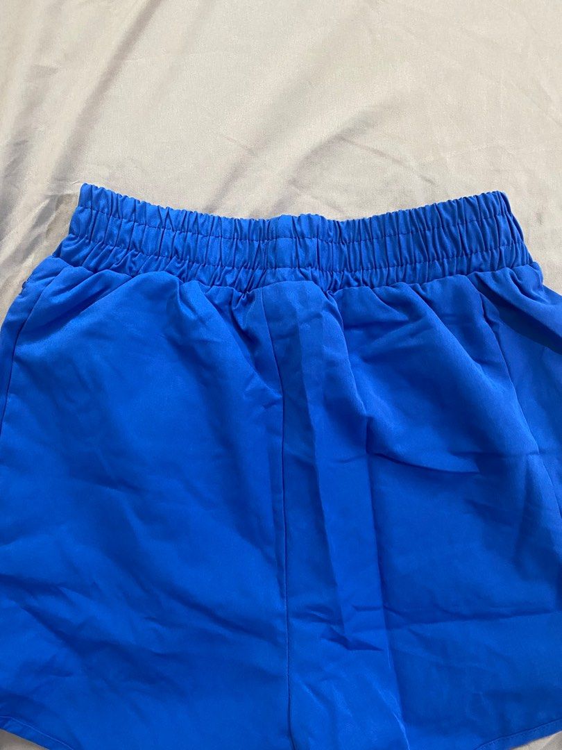 Lotus Active Wear Running Shorts (Category: Shorts) located in Mariveles. Submitted by elicopter (Listing ID 1400440740, Image 3). Description: Brand New / Too big for me - Size: S - Color: Blue - Condition: Excellent - Features: Comfortable fit, pocket for essentials - Perfect for running or casual wear.