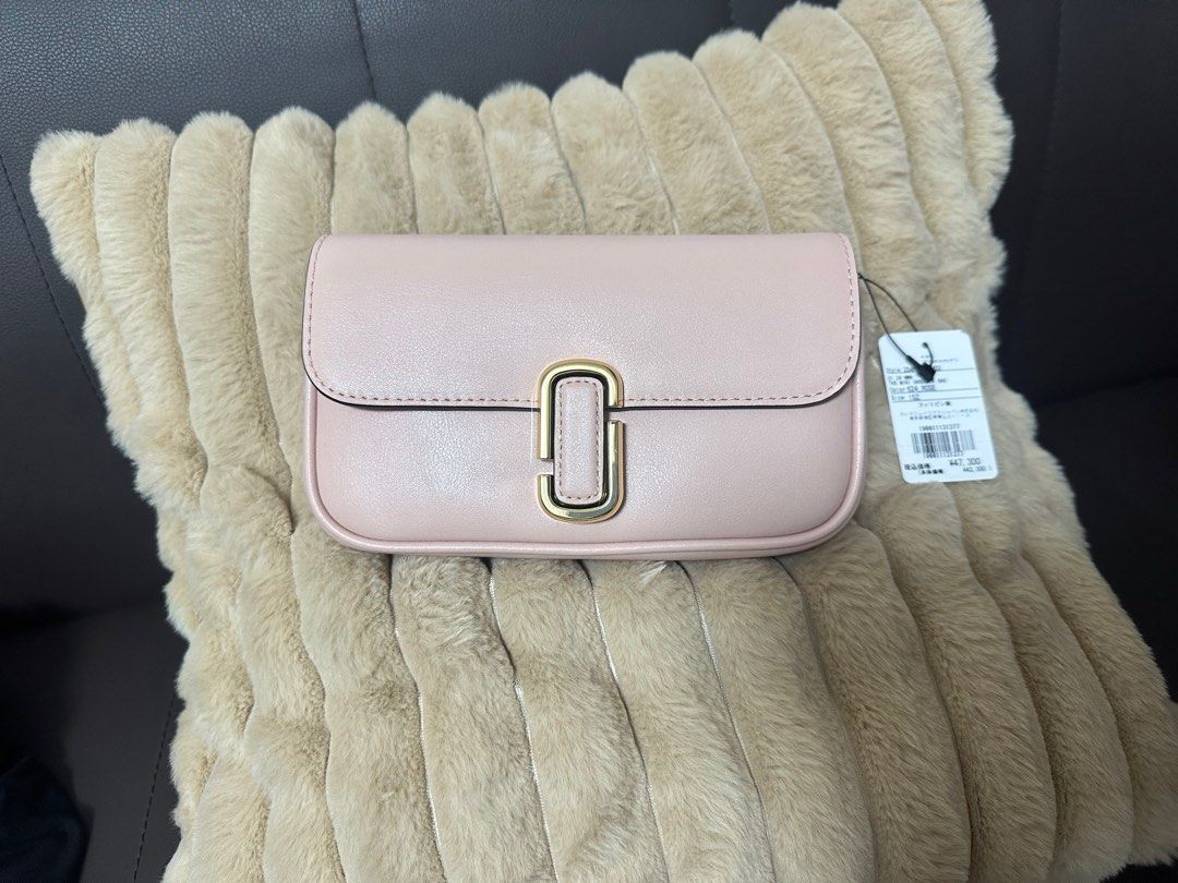Marc Jacobs The J Marc Soft Shoulder Bag (Category: Luxury Bags & Wallets) located in Santa Rosa. Submitted by mamayeye (Listing ID 1400476568, Image 2). Description: PINK MINI SHOULDER BAG! Looking for a gift this Christmas?🎄 BRAND NEW! Marc Jacobs (Japan) 20cm wide 4cm side 10cm height Light pink With dust bag SF included! Very pretty specially in actual! Will deliver it straight to your address from JAPAN! FIX PRICE Payment through GCash/Bank