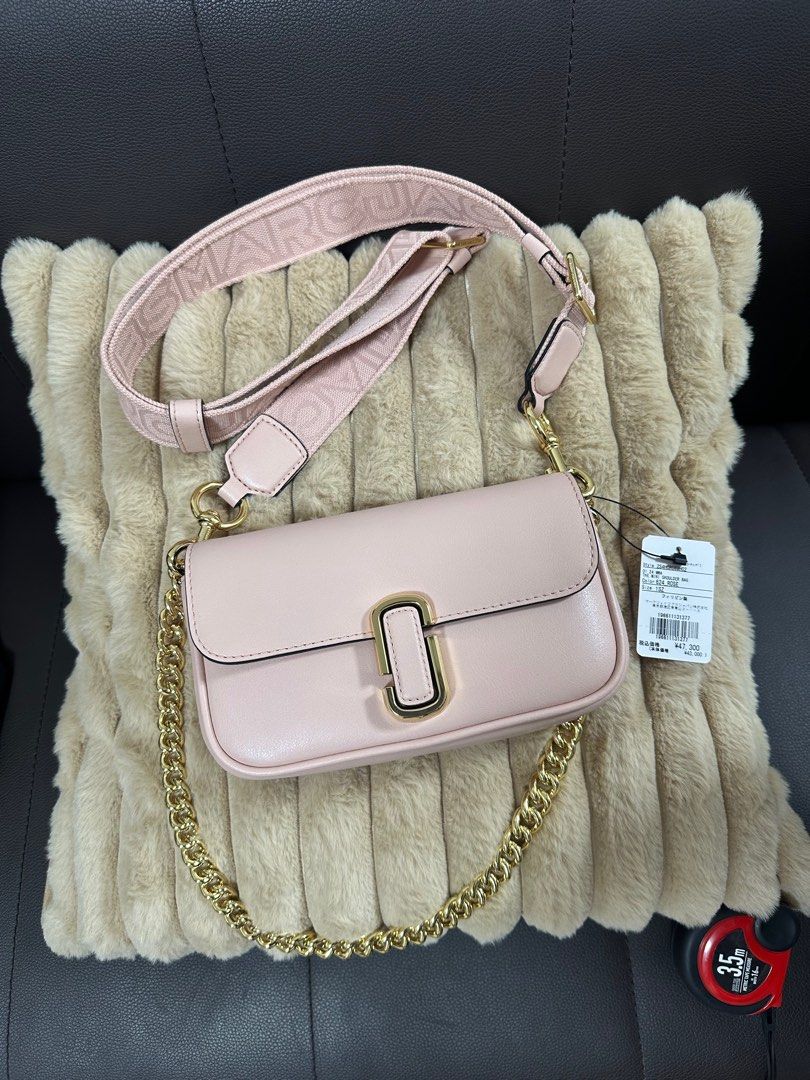 Marc Jacobs The J Marc Soft Shoulder Bag (Category: Luxury Bags & Wallets) located in Santa Rosa. Submitted by mamayeye (Listing ID 1400476568, Image 1). Description: PINK MINI SHOULDER BAG! Looking for a gift this Christmas?🎄 BRAND NEW! Marc Jacobs (Japan) 20cm wide 4cm side 10cm height Light pink With dust bag SF included! Very pretty specially in actual! Will deliver it straight to your address from JAPAN! FIX PRICE Payment through GCash/Bank