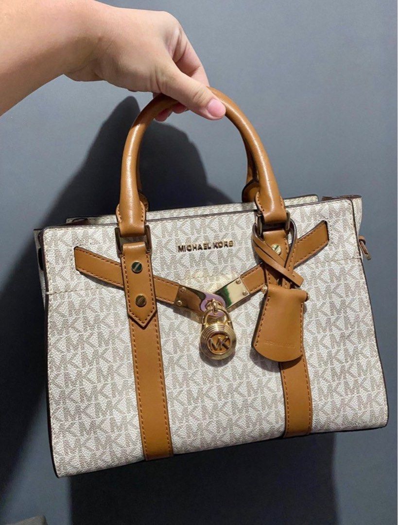 MK white mono hamilton (Category: Luxury Bags & Wallets) located in Batangas. Submitted by bagstolove2.0 (Listing ID 1400529529, Image 1). Description: No sling Good condition.