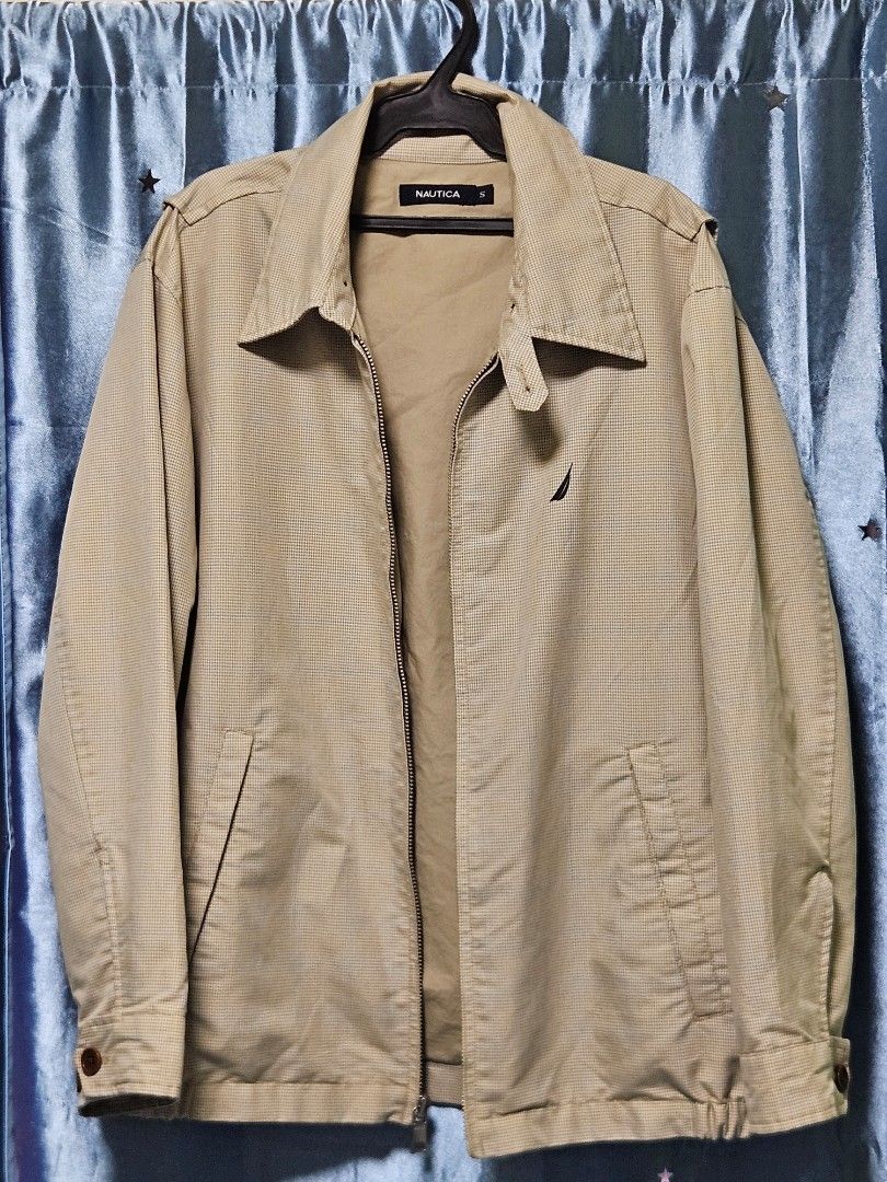 Nautica Beige Plaid Jacket - Size S (Category: Coats, Jackets and Outerwear) located in Candon. Submitted by itssummer08 (Listing ID 1400410417, Image 1). Description: - Nautica jacket - Beige color plaid - Size: Small - Zip-up front - Collared neckline - Two front pockets - Nautica logo on chest - Nautica brand name on back - Button detail on sleeves Good as New Condition 27 x 22.5 inches when laid. medium to large Men. feels like YSL Harrington