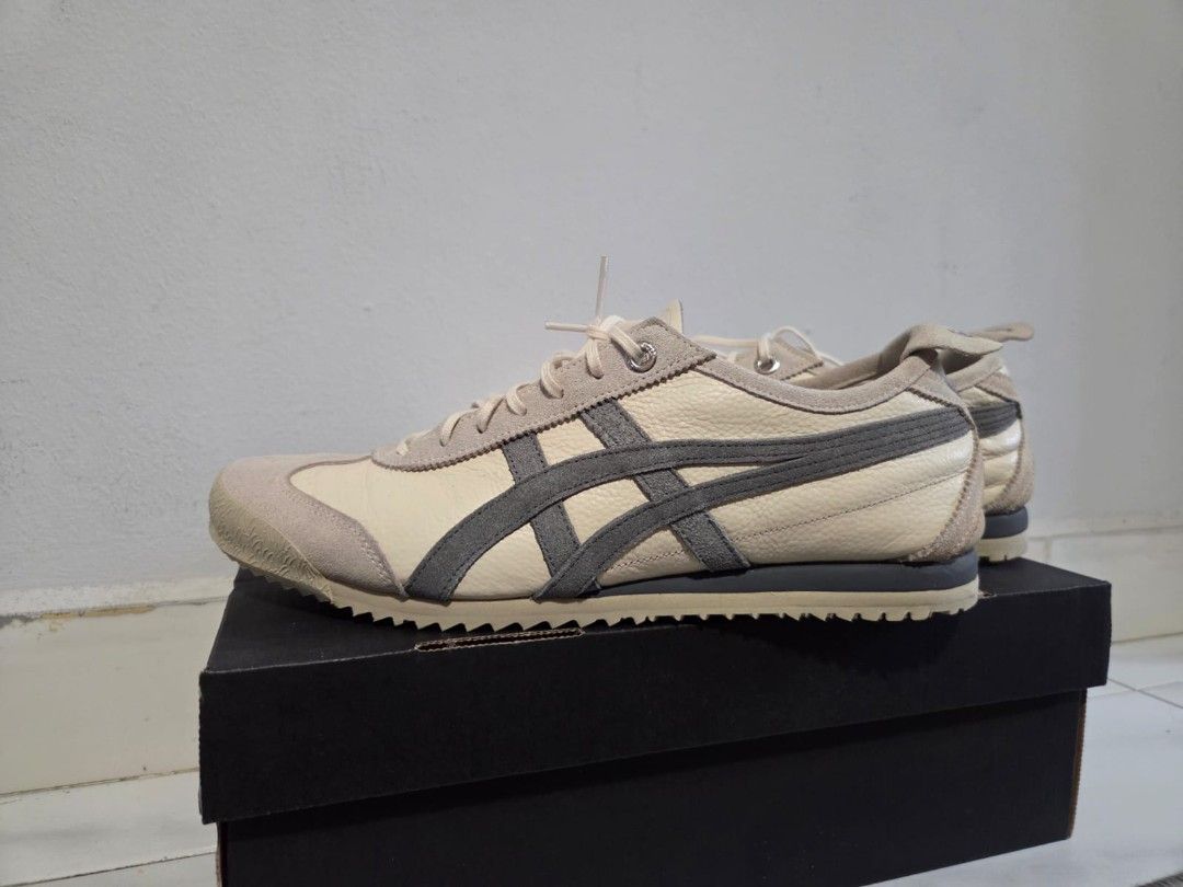 Onitsuka Tiger Mexico 66 Sneakers - US 6.5 (Category: Sneakers) located in Singapore. Submitted by saifulrfx (Listing ID 1400459237, Image 1). Description: - Onitsuka Tiger Mexico 66 - Color: Cream and Grey - Size: US 6.5 / EU 39.5 - Made in Vietnam - Condition: Lightly used - Minor wear on suede and soles - Includes original laces.