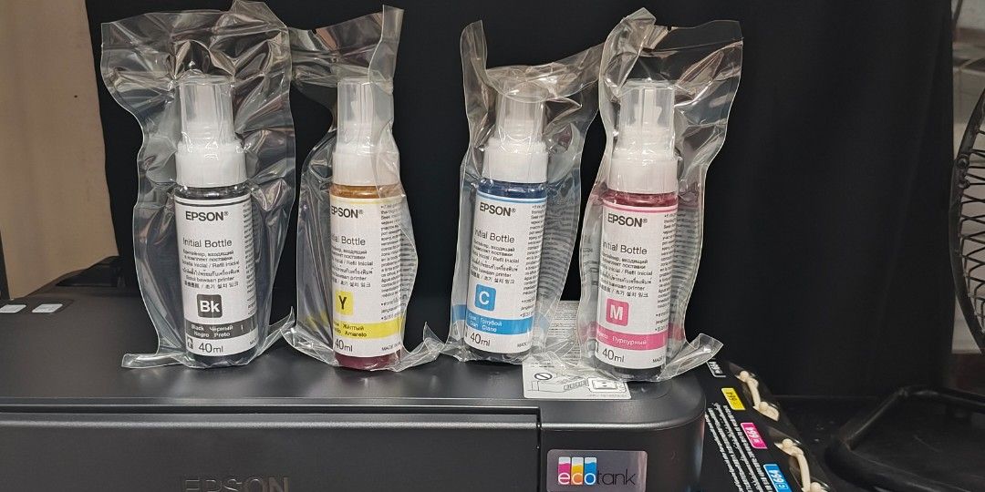 Original Epson L121 ink set (Category: Printers, Scanners & Copiers) located in Cavite. Submitted by bricklairmanila (Listing ID 1400545334, Image 1). Description: you will get all 4 new and sealed.