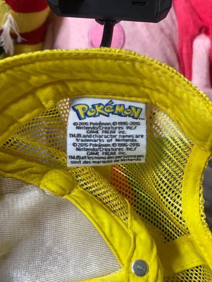 Pokemon Pikachu Cap (Category: Caps & Hats) located in Manila. Submitted by kuya_moto (Listing ID 1400516243, Image 3). Description: - Official Pikachu cap - Features Pikachu's face and ears - Smiling expression - Mesh back for breathability - Adjustable strap for a perfect fit - Licensed Pokemon product - Dated 2015.