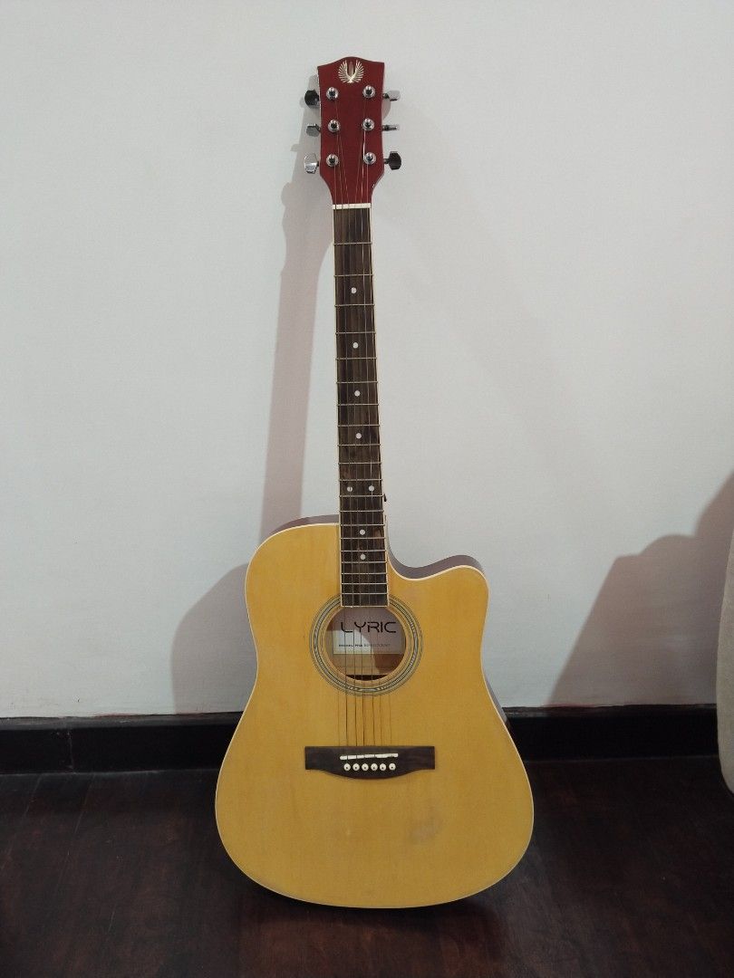MUST GO! Electric/acoustic guitar (Category: Musical Instruments) located in Paranaque City. Submitted by earth_tiger29 (Listing ID 1400396997, Image 1). Description: ⚠️RUSH SALE 💯Lyric electric/acoustic guitar 🥺sinubukang mag aral pero hindi talaga ako pang strings kaya ibebenta na lang ✅with FREE bag ✅ discount to sure buyer 📱DM for details 🏍Delivery only (sf c/o buyer) 📍General Trias Cavite.