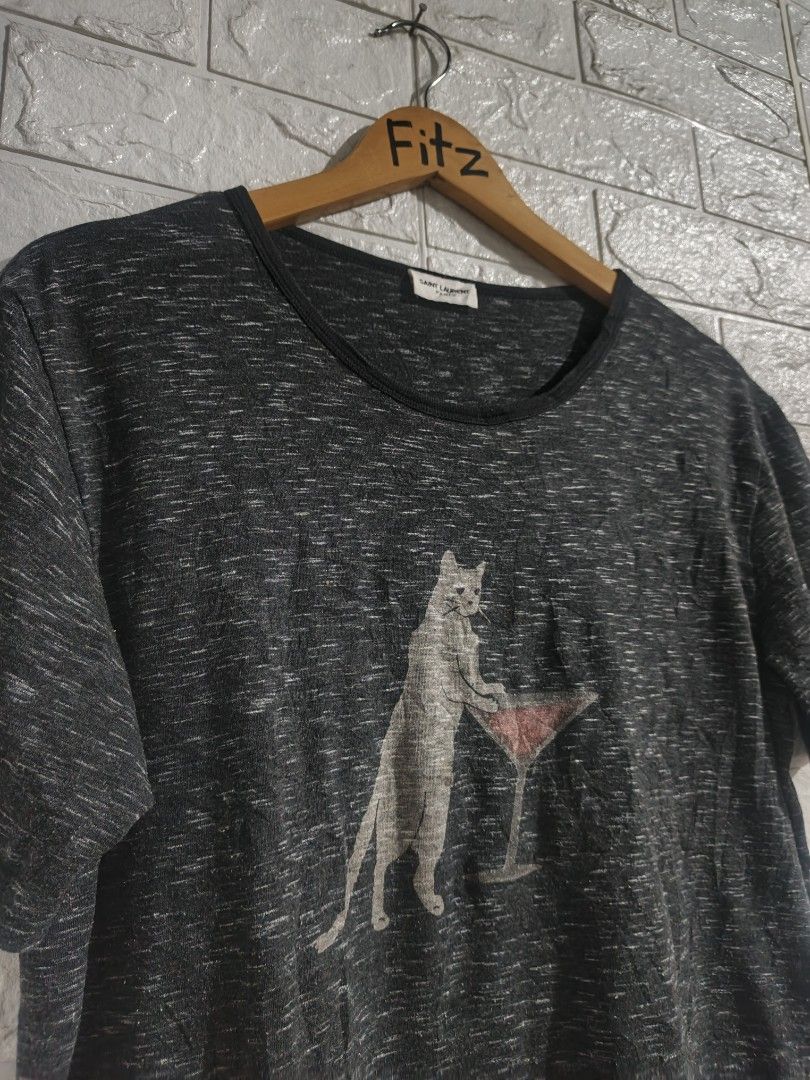 Saint Laurent Paris Martini Cat Tee (Category: Luxury Apparel) located in Agoo. Submitted by fitzmatic15 (Listing ID 1400530600, Image 2). Description: Saint Laurent Paris Martini Cat Tee ‎Small 20x25 ‎Good as new conditiom 10/10 no issue! napakasolid 🔥.