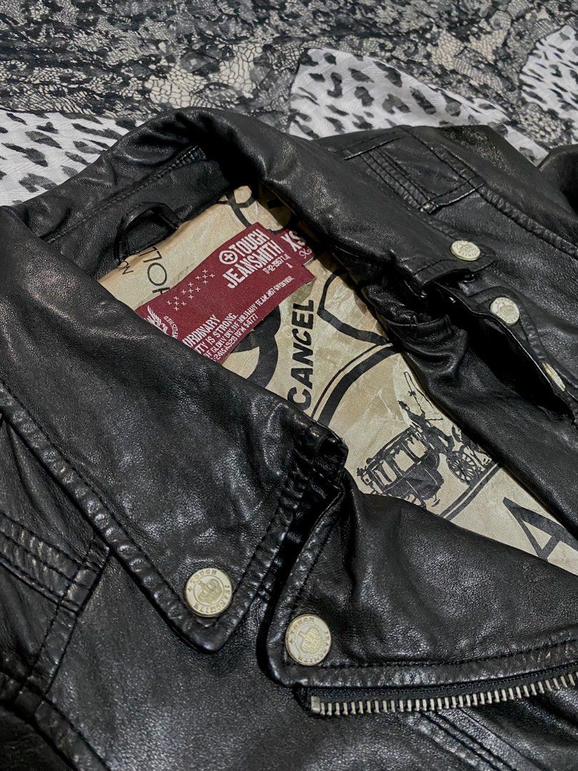 Tough Jeansmith Black Leather Jacket XS (Category: Coats, Jackets and Outerwear) located in Manila. Submitted by nyx___x (Listing ID 1400520460, Image 3). Description: - Thrifted - XS on Tag - Minimal issue on the last slide .