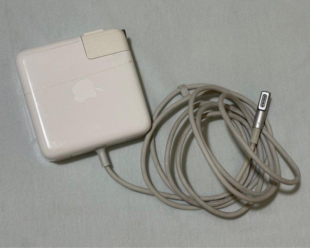 Apple MagSafe L type Power Adapter 60W (Category: Chargers & Cables) located in Santa Rosa. Submitted by chaannecs (Listing ID 1400752411, Image 2). Description: Original apple 60w magsafe power adaptor for macbook Working and no issue Rfs, wala na pag gagamitan Sta rosa laguna area.