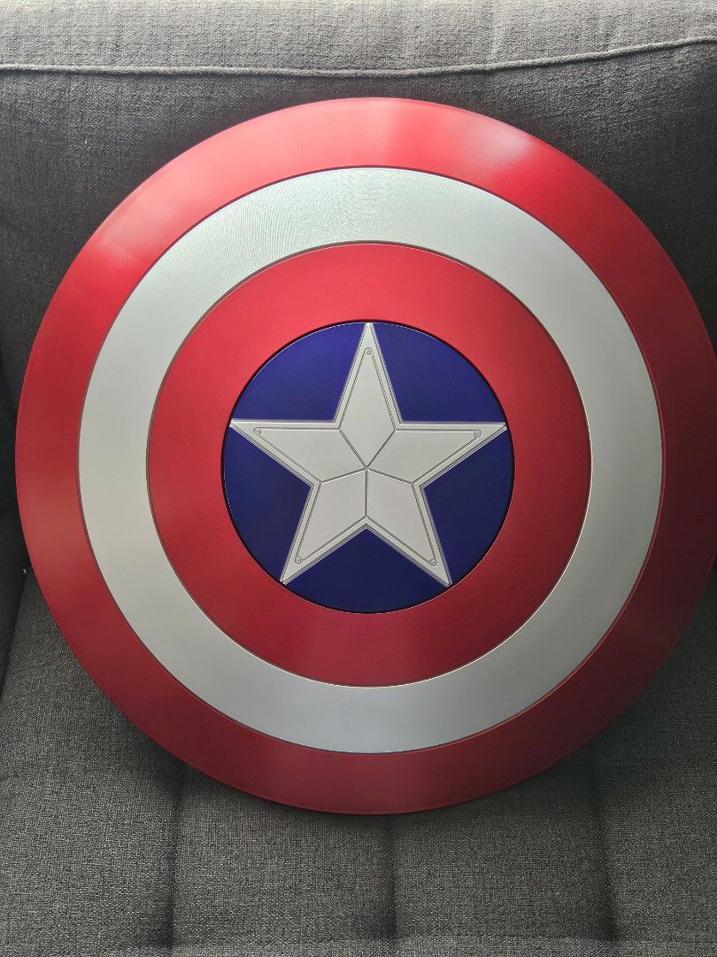 Captain America Movie Accurate Shield (Category: Western Merchandise) located in Paranaque City. Submitted by FitNHobbies (Listing ID 1400667323, Image 2). Description: CAPTAIN AMERICA SHIELD - Weighted - Hard Plastic - Metallic Finish - Synthetic Leather Straps - 1:1 Movie Accuracy - Perfect for Cosplay Price: PHP3,799 Location: Alabang Hills Delivery: Lalamove (Buyer's Expense) Payment: CASH or GCASH.