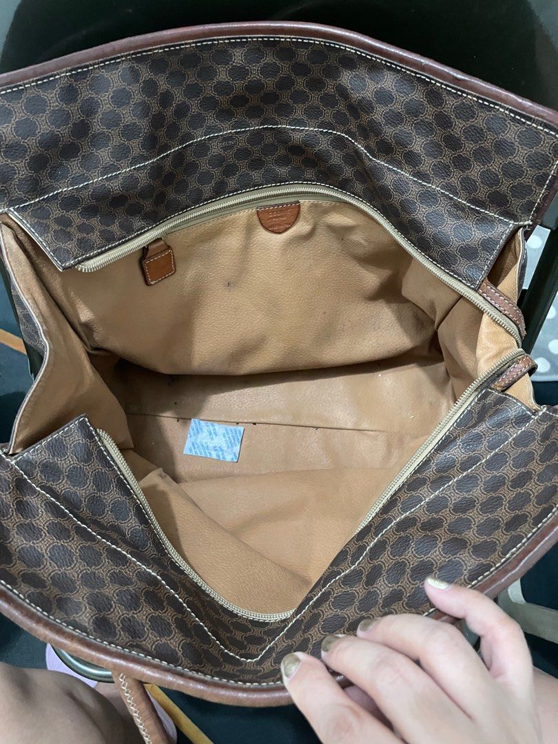 CELINE Macadam Tote Bag (Category: Tote Bags) located in Manila. Submitted by ThatPinkInTheCorner (Listing ID 1400725330, Image 3). Description: Vintage authentic Celine Macadam Tote Bag. One strap torn in the middle. Totally restorable if you have enough budget. This can easily be flipped to 20k and up upon checking on Google. Still functional, zippers still work, hardware still intact. Other flaws shown in the images. Bawal sa maselan. Don’t he