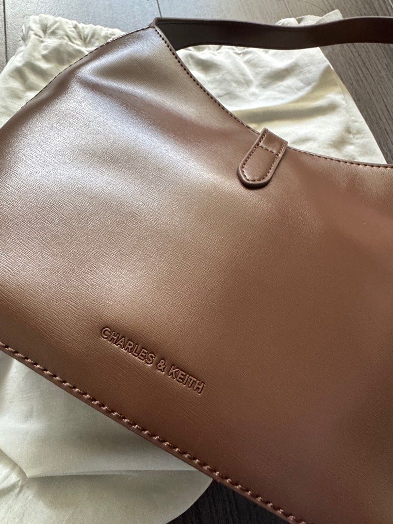 Charles and Keith Wisteria Brown (Category: Shoulder Bags) located in Paranaque City. Submitted by projectminimalist (Listing ID 1400589641, Image 3). Description: Unused Rags removed Comes with long strap.