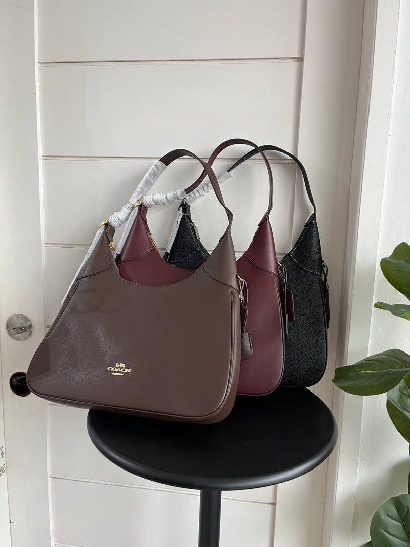 Coach Ella New Collection (Category: Luxury Bags & Wallets) located in Batangas. Submitted by YSABELLE_MARGARETTE (Listing ID 1400637982, Image 1). Description: - Brand new Coach shoulder bag - Available colors: Black, Brown, Burgundy - Sleek design with single shoulder strap - Secure zip closure - Spacious interior - Includes signature Coach hangtag - Perfect for everyday or special occasions.