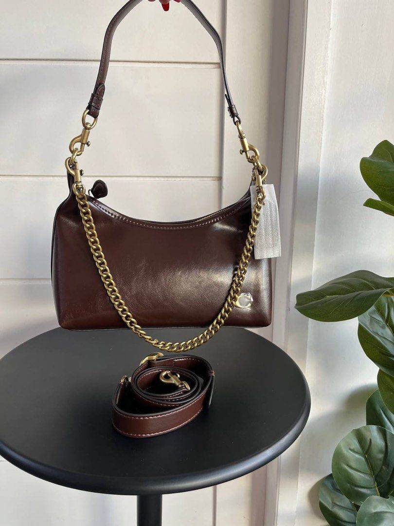 Coach Juliet Classic (Category: Luxury Bags & Wallets) located in Batangas. Submitted by YSABELLE_MARGARETTE (Listing ID 1400638456, Image 2). Description: - Coach shoulder bag - Available colors: Black, Brown, Monogram - Includes chain strap and adjustable strap - Zippered main compartment - Interior pocket - Coach logo visible - Comes with tags.