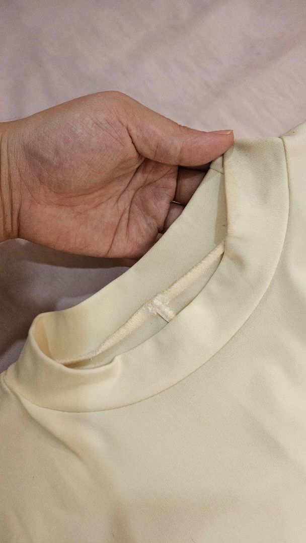 Cream-colored Turtleneck Bat's wing Dress (Category: Dresses) located in Davao. Submitted by bvxbmvn (Listing ID 1400678662, Image 3). Description: Cream-colored Turtleneck Bat's wing Formal Dress very stylish dress for formal events! the bat's wing design has 2 looped openings that shows the arms/shoulders the skirt is a flowy a-line small stains on the collar best fits medium frames all clothing items are washed before packing and sending thank