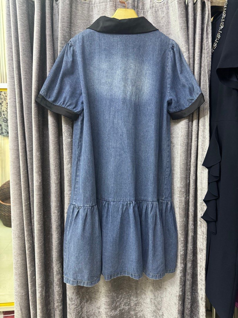 Denim Dress with Black Collar (Category: Dresses) located in Manila. Submitted by qualitylovedph (Listing ID 1400684811, Image 2). Description: - Denim dress - Black collar - Short sleeves - Button-down front - Two front pockets - Ruffled hem - Casual style.