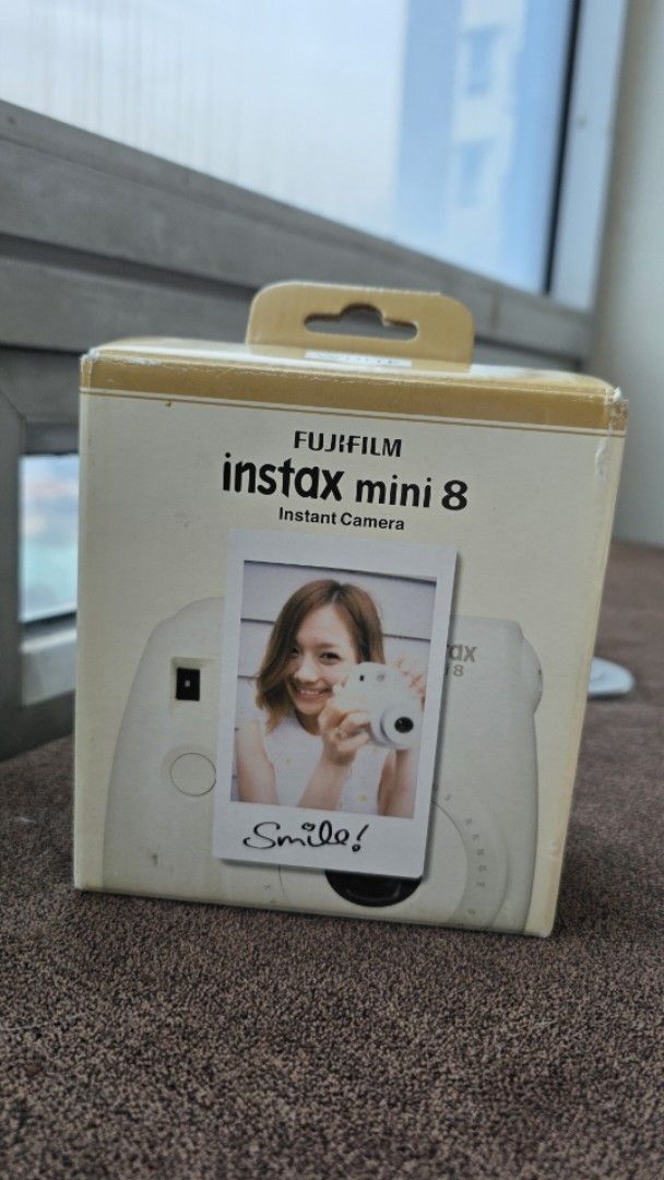 Fujifilm Instax Mini 8 Instant Camera (Category: Cameras) located in Pasay City. Submitted by glc08 (Listing ID 1400653745, Image 1). Description: BRAND NEW IN BOX - Fujifilm Instax Mini 8 instant camera (white) - Includes original box and strap - Built-in flash and lens - Takes instant photos.