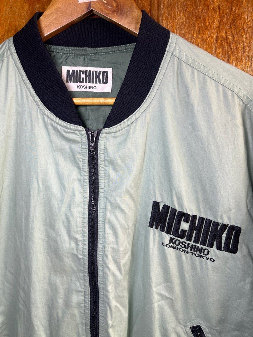 Jacket MK (Category: Coats, Jackets and Outerwear) located in Johor Bahru. Submitted by aswad7889 (Listing ID 1400631383, Image 3). Description: Michiko Koshino -Size L -Pit (24inch) / Length (26inch) -Condition 9/10 -Price RM55 -Postage SM(RM8) / SS(RM16).