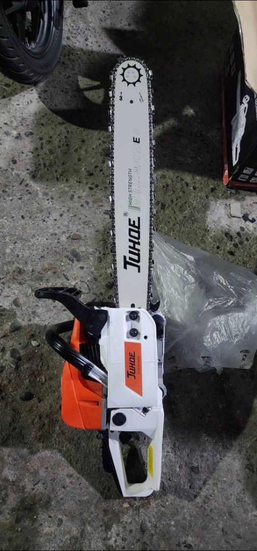 JUHOE Gasoline Trimmer and Chainsaw (Category: Construction Tools & Equipment) located in Bulacan. Submitted by leileilei09 (Listing ID 1400731680, Image 2). Description: - New JUHOE Gasoline Trimmer - Designed for professional mowing - New Chainsaw - Ideal for gardening and landscaping - Both items are new and unused.