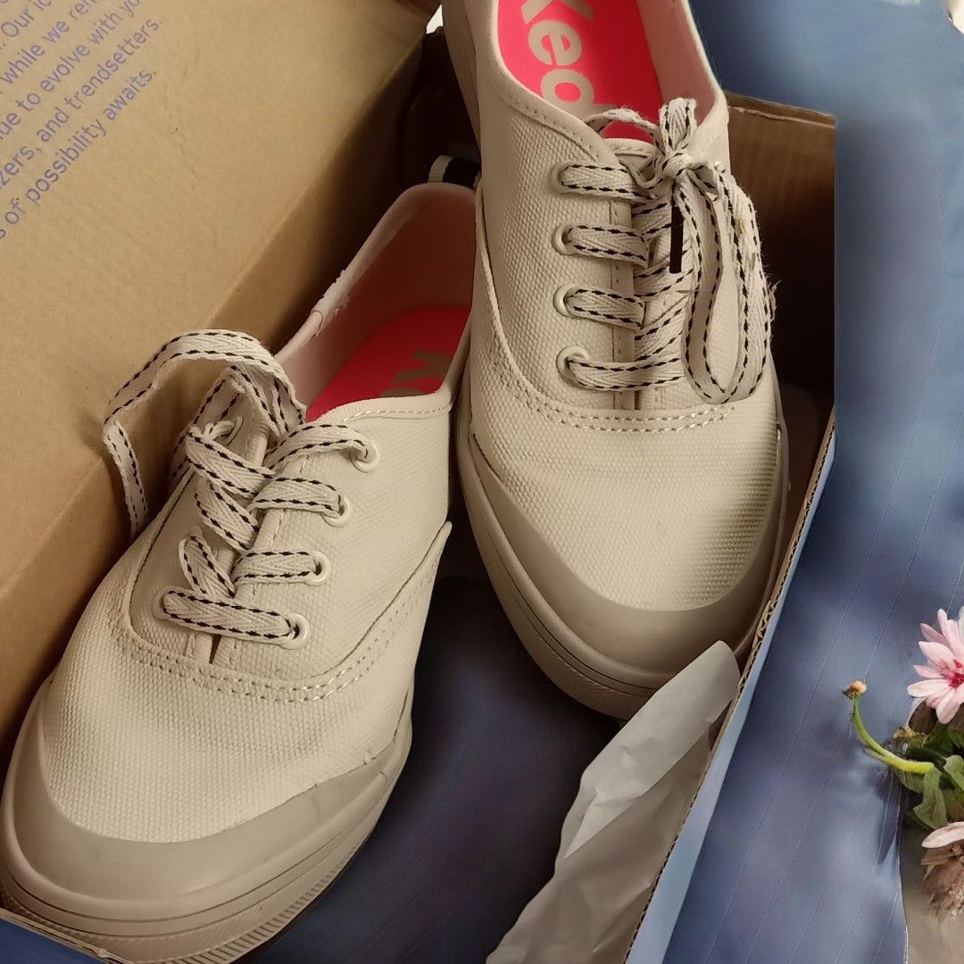 Keds Original/Authentic (Category: Sneakers) located in Quezon City. Submitted by mazonifyph (Listing ID 1400640144, Image 1). Description: Original/Authentic Keds Women's Oatmeal Black Wrong size I'm 7.