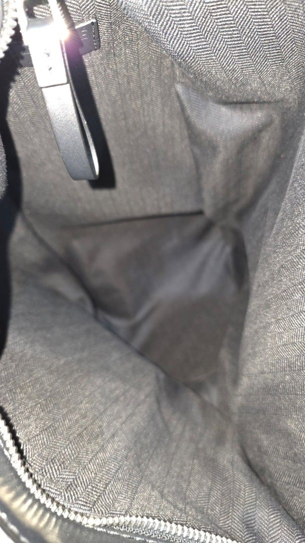 Loewe Anton Backpack (Category: Luxury Bags & Wallets) located in Manila. Submitted by rjcsbn2020 (Listing ID 1400764046, Image 3). Description: Authentic Loewe Anton Backpack in Textile and Calfskin Looks new Used twice Bought from Loewe EU website Comes with tags and dustbag Height 17in Length 9 Depth 9.5 RFS: I don't use it.