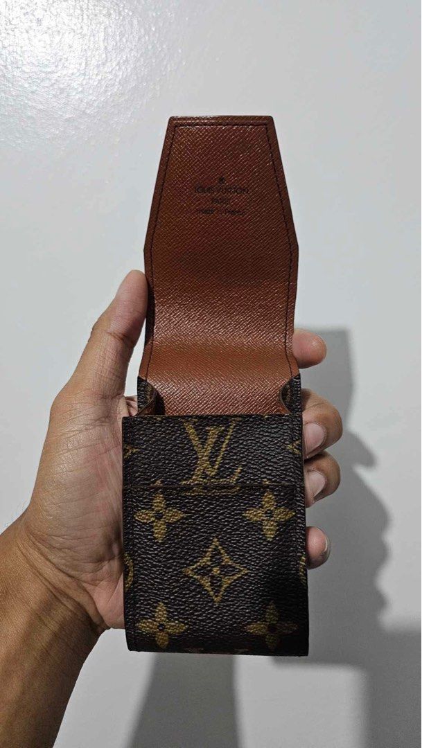 Louis Vuitton Monogram Cigarette Case (Category: Luxury Bags & Wallets) located in Caloocan City. Submitted by rmdesilva (Listing ID 1400599013, Image 2). Description: - Authentic Louis Vuitton cigarette case - Iconic Monogram canvas - Brown leather interior - Features Louis Vuitton Paris Made in France stamp - Flap closure - Ideal for cigarettes or small items - Stylish and compact accessory.