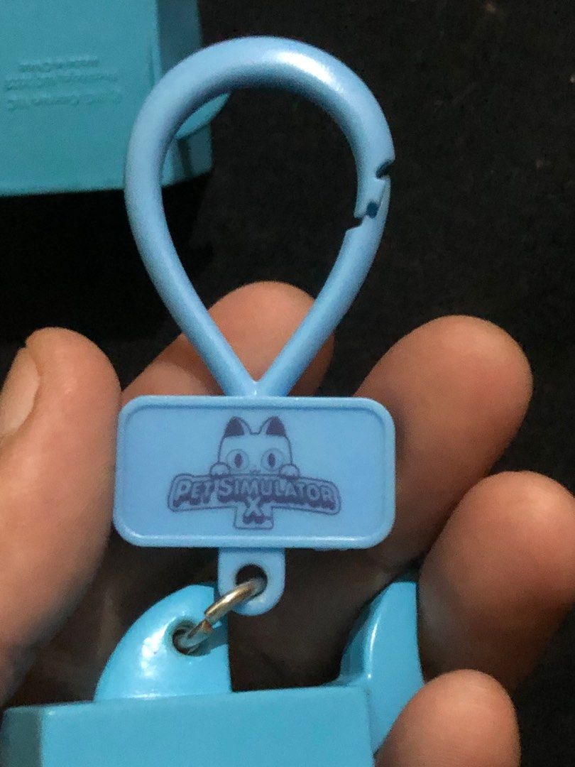 Pet Simulator X cube shark figure charms (Category: Designer & Blind Box Toys) located in Quezon City. Submitted by markgolveo (Listing ID 1400673379, Image 3). Description: Pet Simulator X cube shark figure charms.