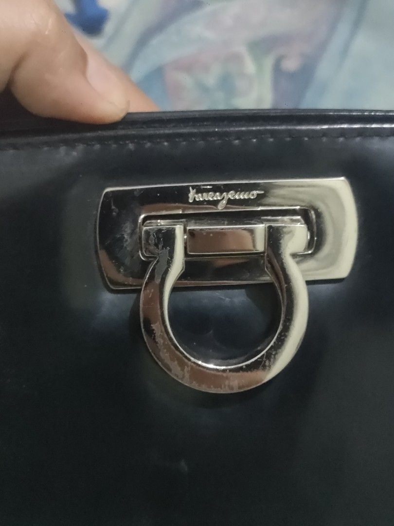 Salvatore Ferragamo (Category: Luxury Bags & Wallets) located in Sindangan. Submitted by branden_line (Listing ID 1400693378, Image 2). Description: Salvatore Ferragamo clutch bag only black leather silver hardware vintage bag.