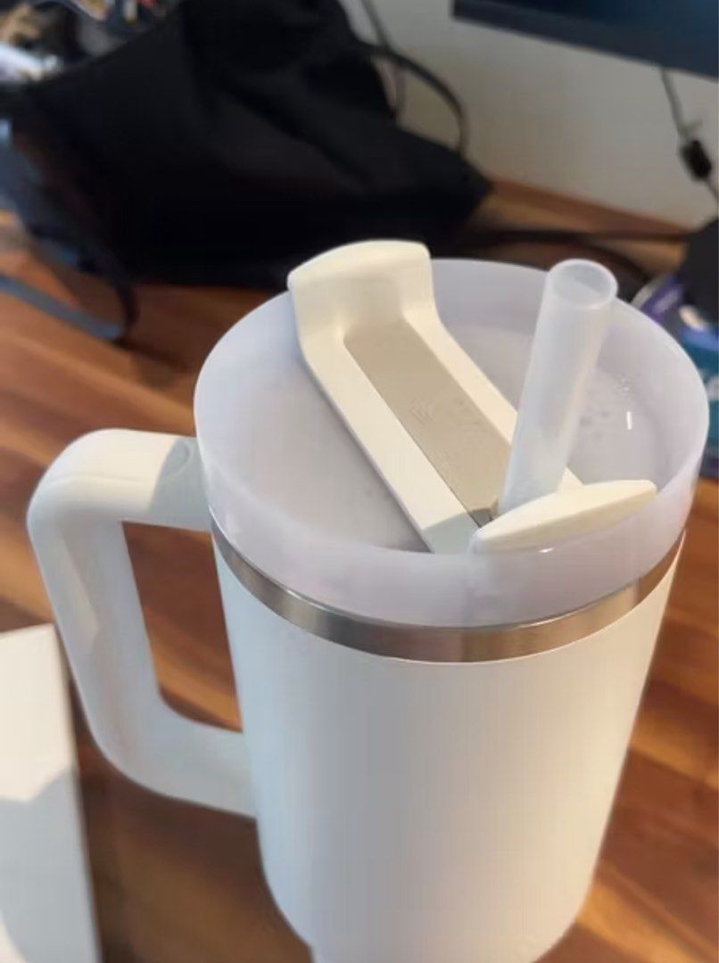 Stanley The Quencher H2.0 FlowState Tumbler - Frost (Category: Water Bottles & Tumblers) located in Singapore. Submitted by xevangeline (Listing ID 1400770799, Image 2). Description: Stanley The Quencher H2.0 FlowState Tumbler Size: 40oz/1182ml Colour: Frost Retail price: $76 Selling for: $49 Used few times, selling as i prefer another colour Pick up at One raffles quay, tampines walk or evergreen gardens.