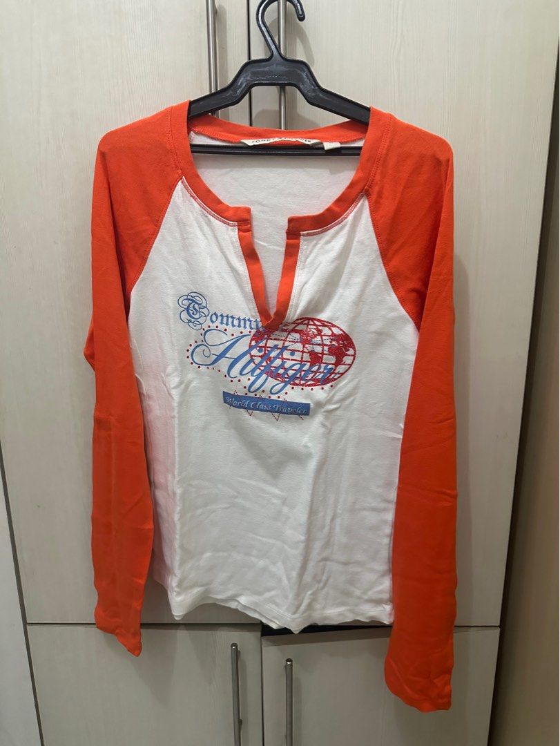tommy hilfiger orange shirt (Category: Shirts) located in Quezon City. Submitted by cheemsspanda (Listing ID 1400694550, Image 1). Description: not sure if its real haha rfs: decluttering can meet up in katipunan.