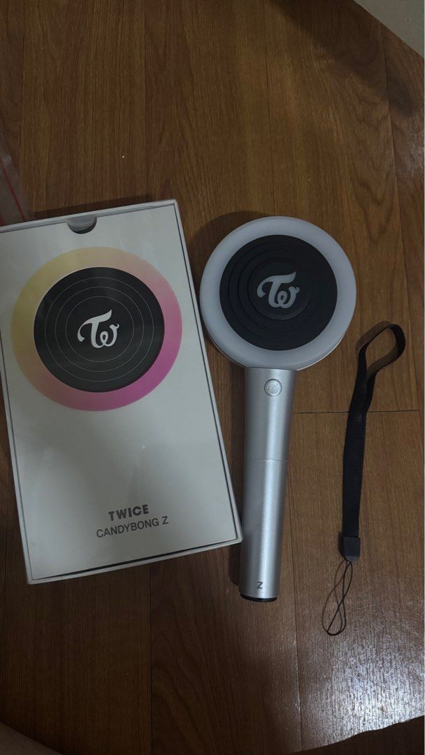 TWICE Candybong Z Lightstick (Category: K-Wave Merchandise) located in Manila. Submitted by _alexxxx (Listing ID 1400765126, Image 1). Description: ❗️can give discount ❗️message for more pics and vids - bought in Korea - never been used - Official TWICE Candybong Z lightstick - Includes original box and wrist strap.