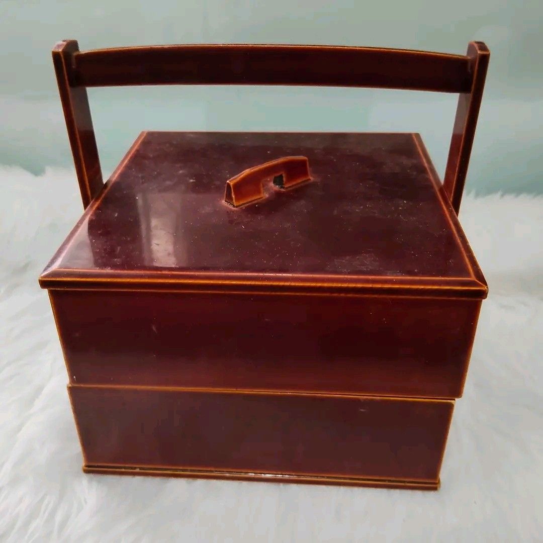 Vintage Wooden Storage Box with Handle (Category: Storage Boxes & Baskets) located in Catbalogan. Submitted by jpnsrpls (Listing ID 1400671841, Image 2). Description: - Vintage wooden storage box - Two-tiered design - Convenient handle - Rich, dark brown finish - Secure lid - Well-crafted - Suitable for various items - Classic design.