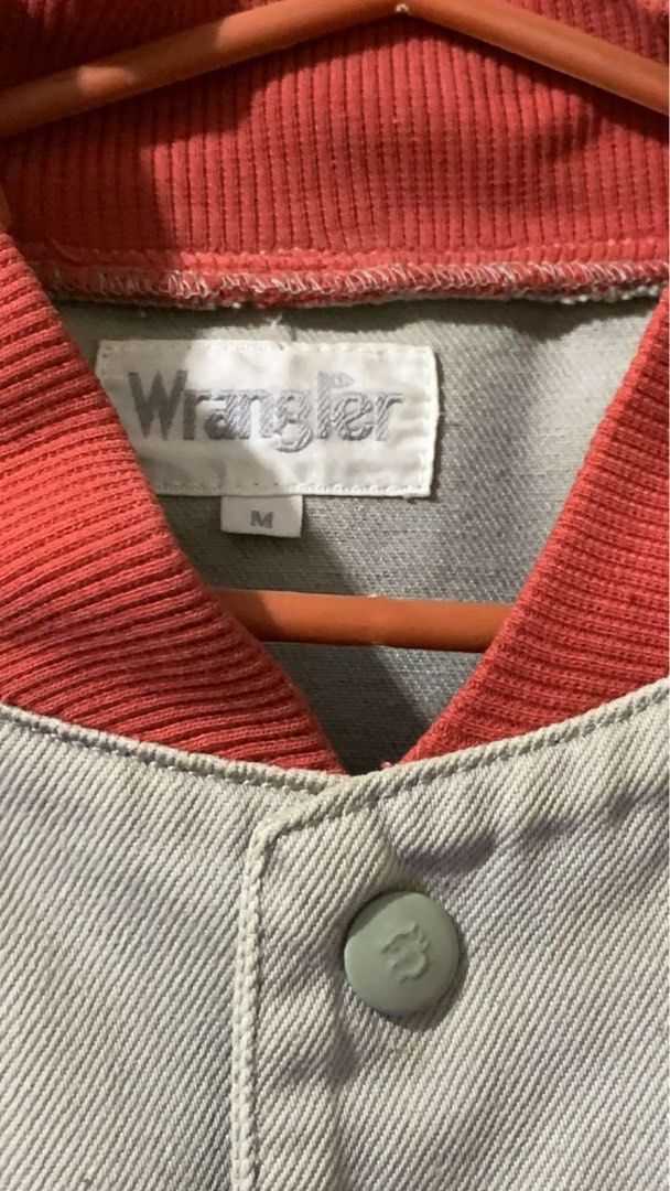 Wrangler Classic Varsity Jacket (Category: Coats, Jackets and Outerwear) located in Manila. Submitted by PL_Finds (Listing ID 1400715178, Image 2). Description: - Vintage Wrangler varsity jacket - Size: M - Color: Red collar and cuffs, beige body, denim sleeves - Features: Button-up closure, front pocket, classic chest patch.
