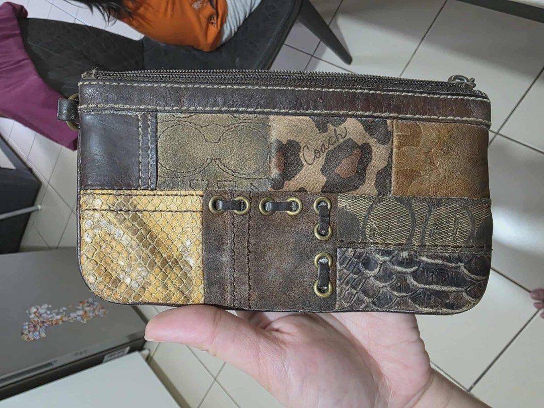 Wristlet Patchwork (Category: Luxury Bags & Wallets) located in Mariveles. Submitted by declouterringmom (Listing ID 1400685783, Image 2). Description: With sign of use.
