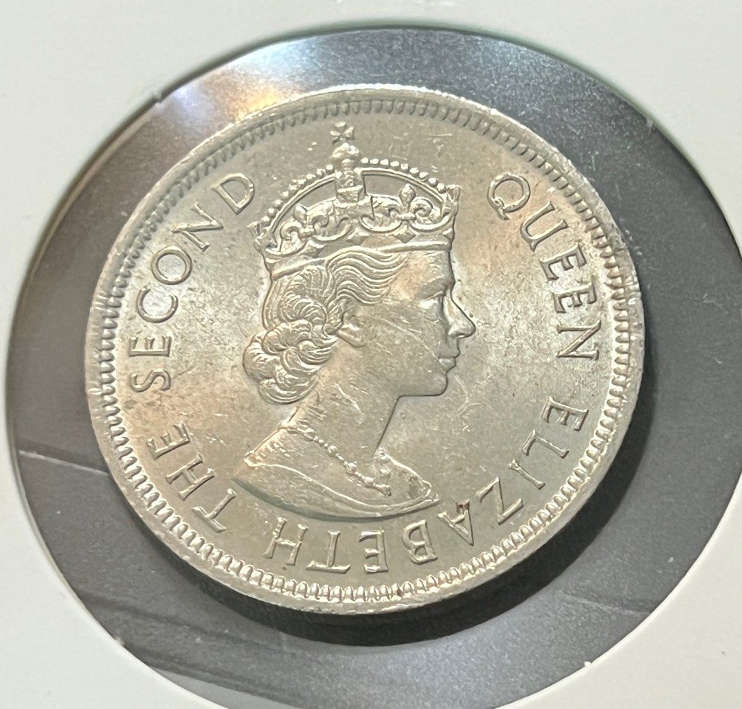 香港1973 大壹圓一元$1硬幣英女皇伊麗莎白二世像原光光澤流動VF 流通上品, 興趣及遊戲, 收藏品及紀念品, 錢幣- Carousell