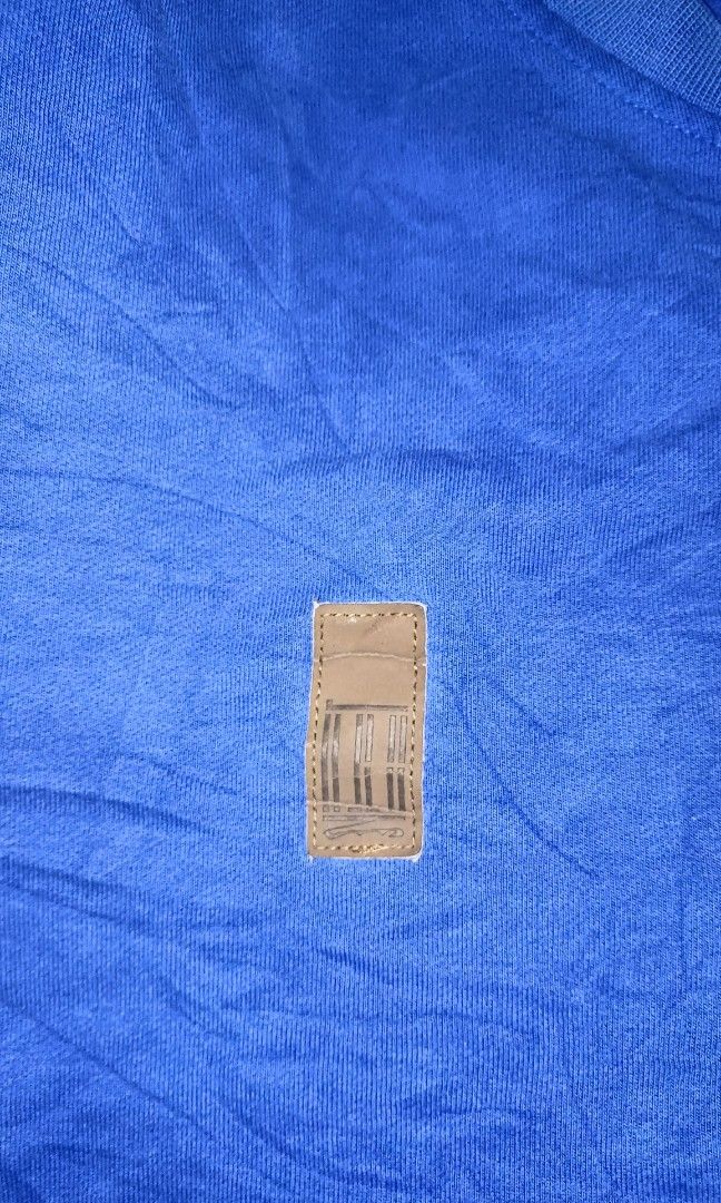 ADIDAS BLUE SWEATSHIRT XL (Category: Coats, Jackets and Outerwear) located in Lucban. Submitted by goodsheetcollection (Listing ID 1400970256, Image 3). Description: - Adidas blue sweatshirt - Size: XL (Measurements: 28x22) - Features Adidas logo on chest - Small patch on left sleeve - Crew neck - Long sleeves - Made of soft, textured material.