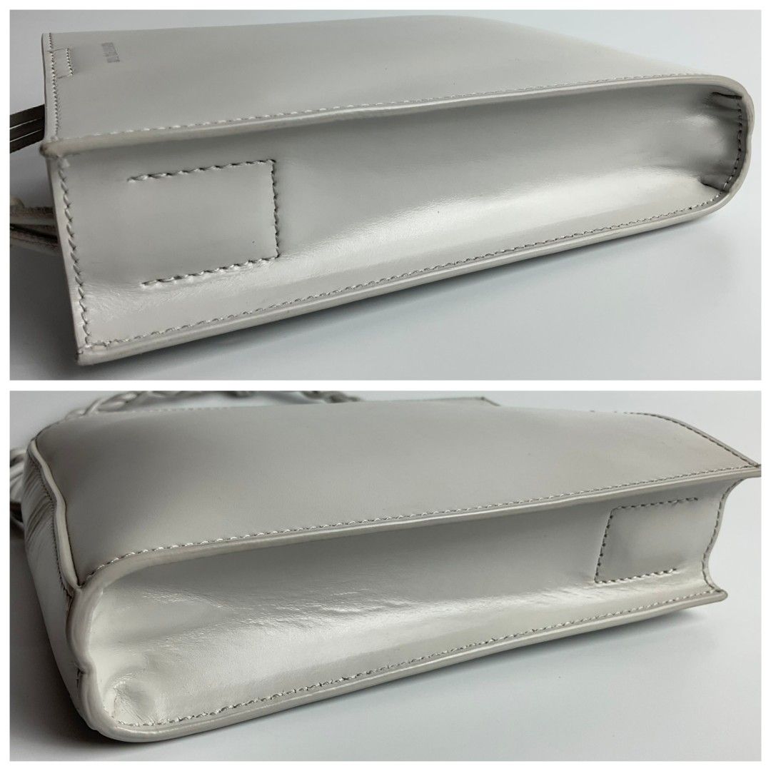 Auth Jil Sander bag (Category: Luxury Bags & Wallets) located in Caloocan City. Submitted by siftedthriftedph (Listing ID 1400851542, Image 3). Description: Jil Sander Tangle bag Light gray color, minimalist design Beautiful leather H-7.08in x L-5.51in.