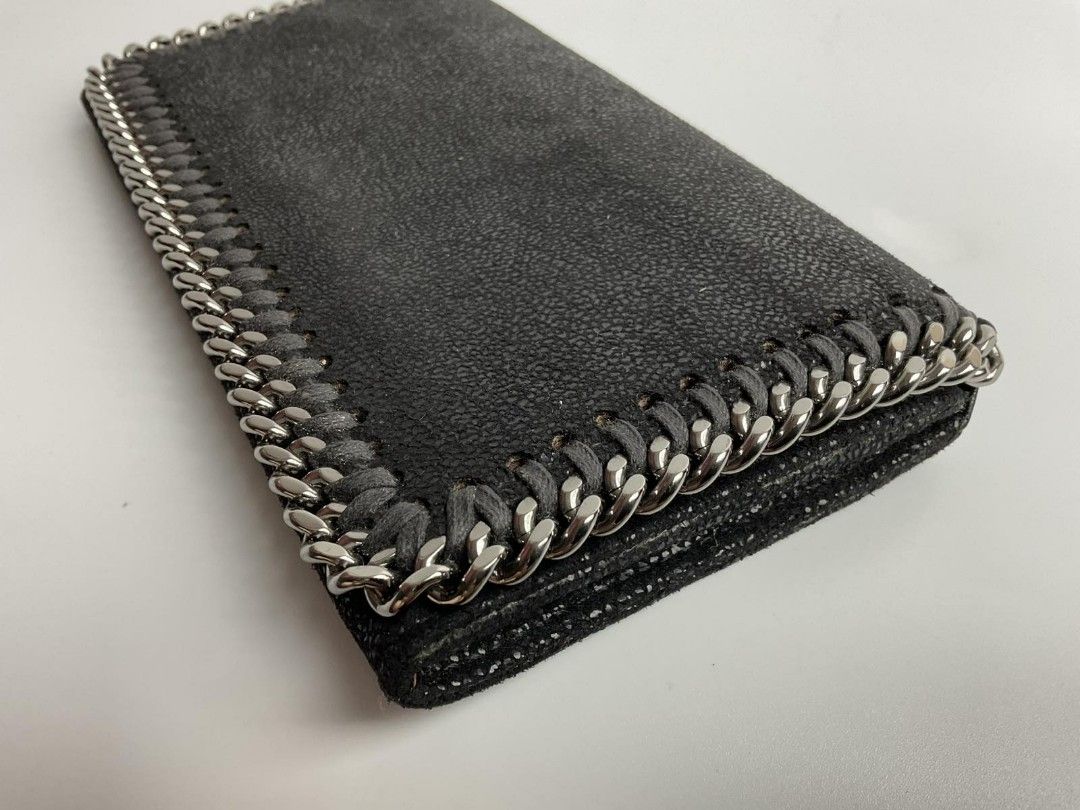 Auth Stella McCartney continental wallet (Category: Luxury Bags & Wallets) located in Caloocan City. Submitted by siftedthriftedph (Listing ID 1400853261, Image 3). Description: Iconic Falabella continental wallet In "shaggy deer" material, inside is in black vegan leather, sustainable and vegan production. This item is made from non-leather, cruelty-free materials using highly skilled manufacturing techniques. The lining has been created from re