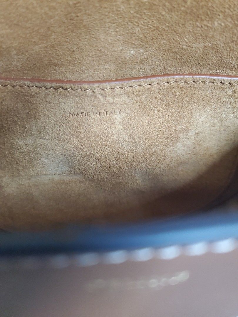 Celine Triomphe Shoulder Bag (Category: Luxury Bags & Wallets) located in Manila. Submitted by mavel0817 (Listing ID 1400827842, Image 3). Description: - Celine Triomphe shoulder bag - Color: Brown - Leather interior lining - Includes dust bag - Stitched design - Celine brand name visible inside.