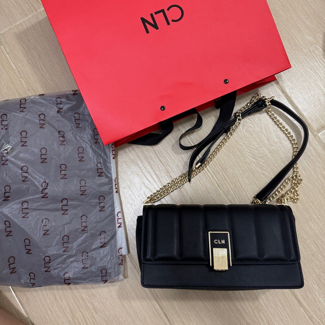SOLD! CLN Black 2 way bag Bag (Category: Shoulder Bags) located in Santa Maria. Submitted by grave.ty (Listing ID 1400927687, Image 2). Description: - CLN black shoulder or crossbody bag - LIKE NEW! AS IN! Used once for a wedding only. - Gold hardware - Adjustable Chain with Leather strap - Flap closure with CLN logo - Quilted design - Gold-tone clasp - Detachable strap - Zippered inner compartment - Comes complete with original paper bag eco bag